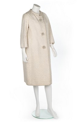 Lot 142 - An Yves Saint Laurent couture white matelassé...