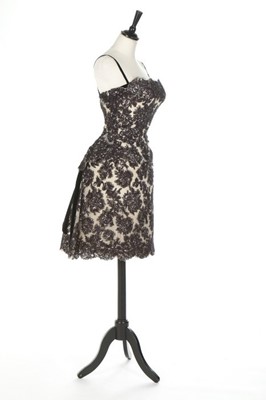Lot 143 - A Carven couture black soutache lace cocktail...