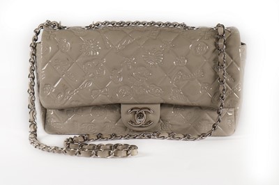 Lot 21 - A Chanel grey embossed patent leather handbag,...