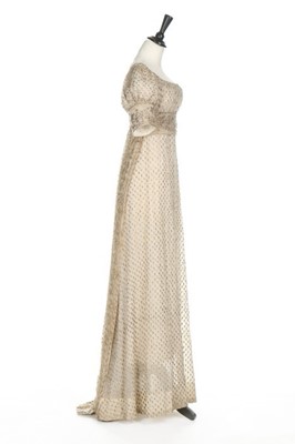 Lot 43 - A silver-strip embroidered muslin dress, circa...