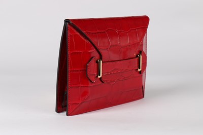 Lot 17 - An Alexander McQueen red mock-croc leather...