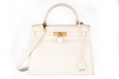 Lot 23 - An Hermès off-white leather Kelly bag, 1991,...