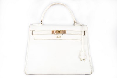 Lot 12 - An Hermès white leather Kelly bag, 1972,...