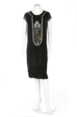 Lot 82 - A Jean Patou couture beaded velvet dress,...