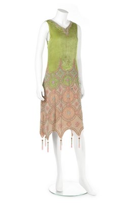 Lot 56 - A Callot Soeurs couture beaded acid green...