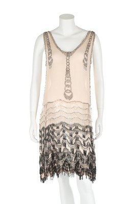 Lot 77 - A couture beaded pale pink chiffon 'flapper'...
