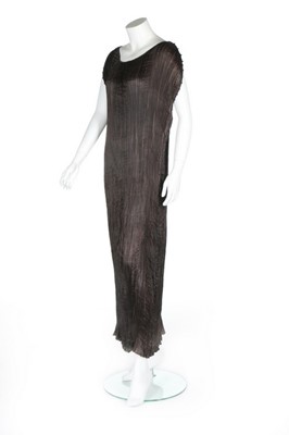 Lot 74 - A Mariano Fortuny steel-grey pleated silk...