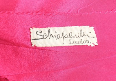 Lot 60 - An Elsa Schiaparelli couture 'shocking pink'...