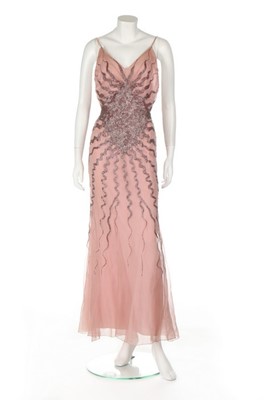 Lot 85 - An haute couture beaded bias-cut pink chiffon...
