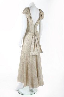 Lot 91 - A rare Jenny couture gold lamé evening gown,...