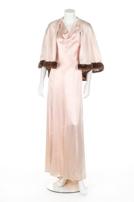 Lot 95 - An early Lucien Lelong couture pink satin bias...