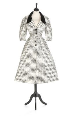 Lot 101 - A Jacques Fath couture printed cotton piqué...