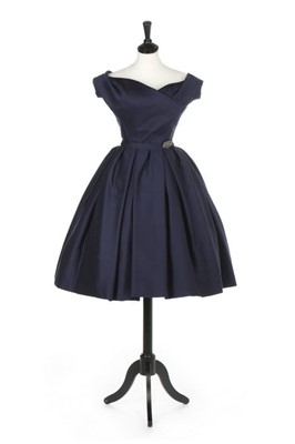 Lot 136 - A Christian Dior couture navy challis dinner...