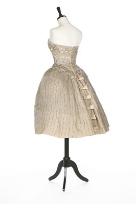Lot 124 - An Elizabeth Arden embroidered cocktail dress,...