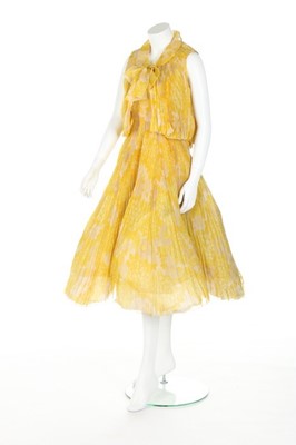 Lot 112 - A Lanvin Castillo couture yellow printed...
