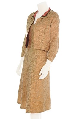 Lot 131 - A Chanel couture brocaded satin cocktail suit,...