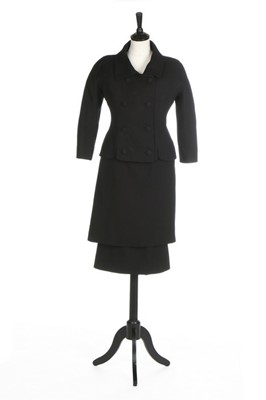 Lot 115 - A Balenciaga couture black wool suit, circa...