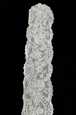 Lot 327 - A Mechlin lappet, circa 1730-40, joined at the...