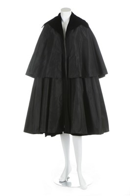 Lot 102 - A Madame Gres couture black taffeta evening...