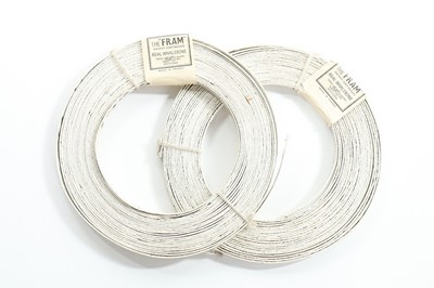 Lot 128 - Two un-used coils of baleen corsetry struts,...