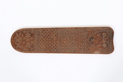 Lot 134 - A carved wooden busk, probably Welsh,...