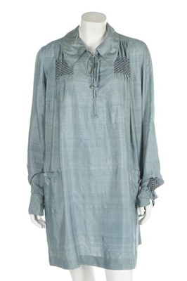 Lot 153 - Two women's smocks, one of blue silk by...