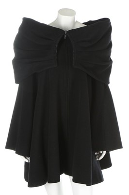 Lot 182 - A Claude Montana black wool swing-jacket, 1988,...