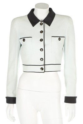 Lot 185 - A Chanel pale ice-blue cotton cropped jacket,...