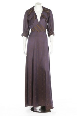 Lot 187 - An Ossie Clark purple satin backed crepe dress,...