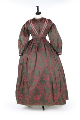 Lot 188 - A green and red damask satin day dress, late...