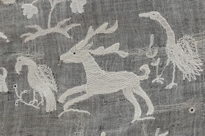 Lot 308 - A fine whitework embroidered muslin apron...