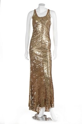 Lot 259 - A gold sequined bias-cut evening gown, 1930s,...