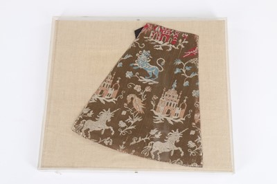 Lot 311 - A fragment of figurative brocaded satin,...