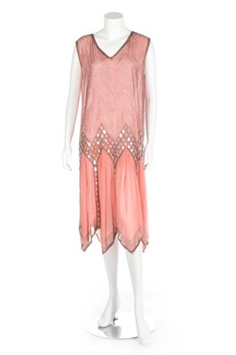 Lot 278 - A pink chiffon beaded flapper dress, 1920s,...