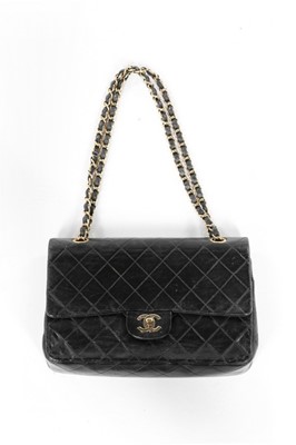 Lot 295 - A Chanel black quilted leather 2.55 bag in...