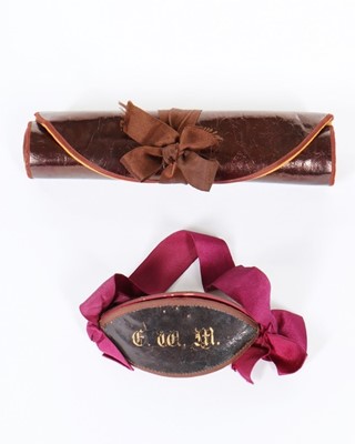 Lot 303 - A dark brown glacé leather and orange satin...