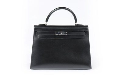 Lot 185A - A good Hermès black leather Kelly bag, 1999,...
