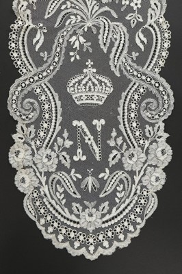 Lot 320 - A 'blonde' bobbin lace stole believed to have...