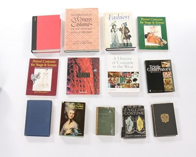 Lot 174 - A general group of books relating to fabrics,...