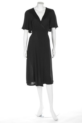 Lot 15 - An Ossie Clark black crpe wrap-around dress...