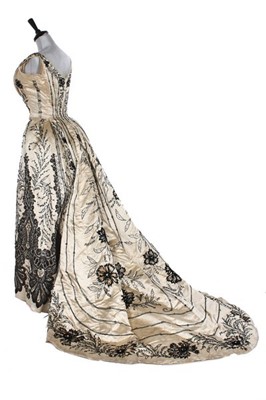 Lot 172 - A couture beaded ivory satin evening gown,...