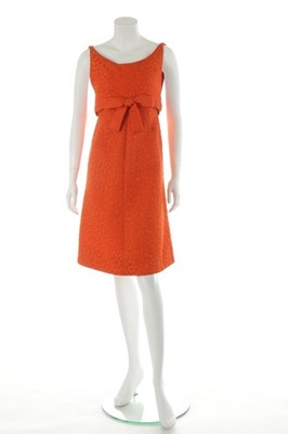 Lot 98 - A Maggy Rouff couture orange cloqué cocktail...