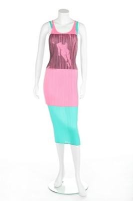 Lot 215 - An Issey Miyake neon-pink pleated polyester...