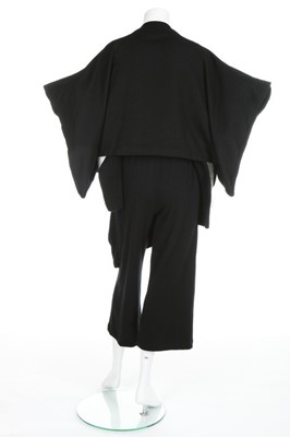 Lot 184 - A Comme des Garçons black knitted top,...
