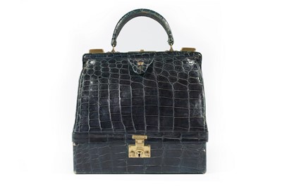 Lot 6 - An Hermès peacock blue crocodile malette,...