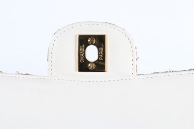 Lot 9 - A Chanel tweed double flap bag, 2003, stamped...