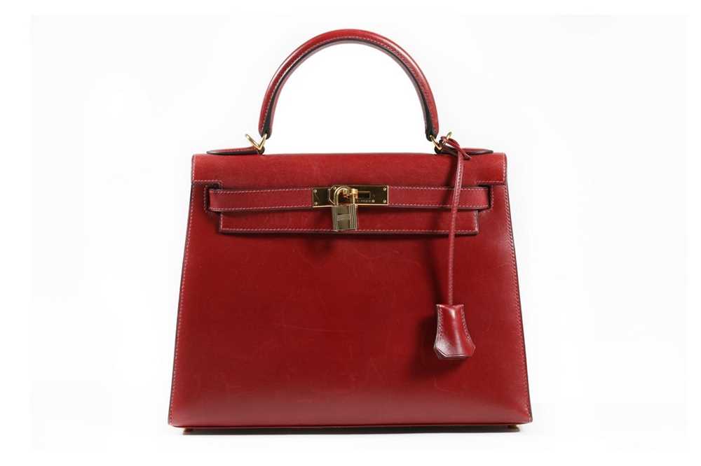 Lot 7 - An Hermès ox-blood box leather Kelly bag, 2001,...