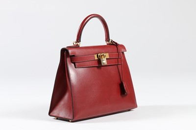 Lot 7 - An Hermès ox-blood box leather Kelly bag, 2001,...