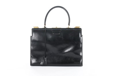 Lot 8 - An Hermès black leather '404' handbag, 1960s,...