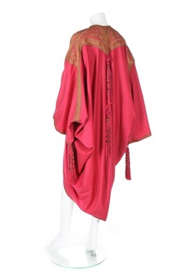 Lot 38 - A Maison Worth cyclamen pink wool evening coat,...